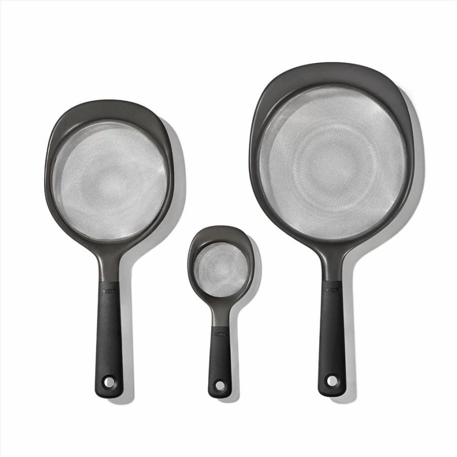 OXO Good Grips 3-Piece Strainer Set - Durable Kitchen Colanders with Ergonomic Handles, BPA-Free Plastic, Black - Essential for Draining Pasta, Vegetables, and More